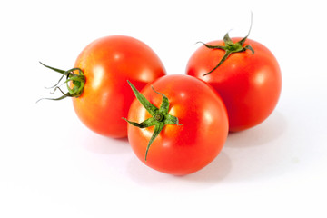 Tomato vegetables pile isolated on white background