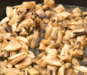 mushrooms fried in a pan