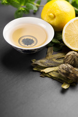 Virious kinds of tea on black table