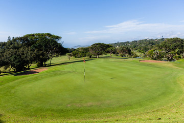 Golf Hole Green Flagstick Water