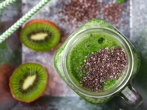 Smoothies of green vegetables and fruits.Kiwi,Apple,spinach,Chia seeds.Drink Concept of Healthy Eating. selective focus.