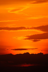 Nice clouds with sunset light at red sky