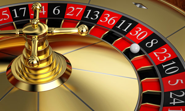  detail of a gold colored roulette. concept of gambling and fun. wealth. copyspace.