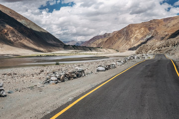 Deserted road in mountain region, India