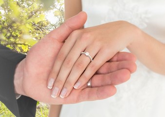 Fototapeta premium Newly wed couple holding hands