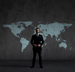 Businessman in suit and tie. Black background with copyspace. Bu
