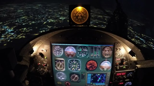 Simulator of night flight above city, training equipment for beginner pilots