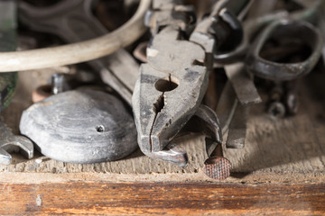 old pliers on shelf