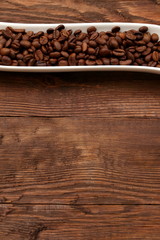 Ziarna kawy w naczynou