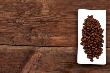 Ziarna kawy w naczynou