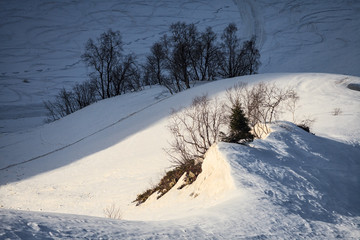 Beautiful scenic landscape of snowy mountain slope in Caucasus mountain at winter