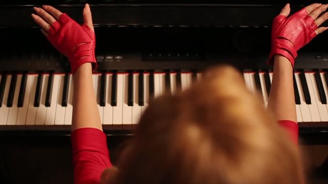 Blondy Girl Playing Piano