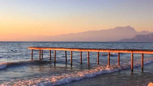 Pontile al tramonto, lago di Garda
