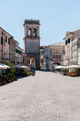 Walking along the street of the old village