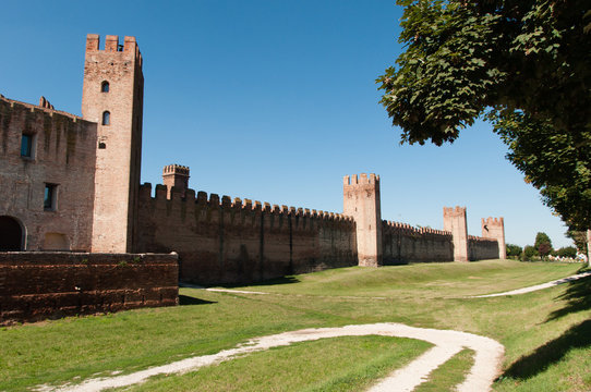 Walking along the street of the old village