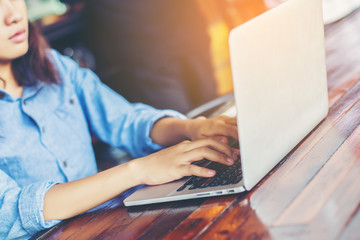 Naklejka premium hand control on a laptop touchpad