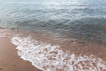 sandy shore of the sea as a backdrop