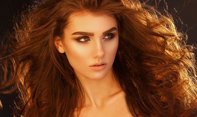 Close up portrait of beautiful woman with volume healthy hair