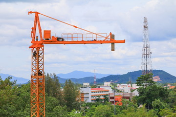 crane tower selective focus and construction in blue sky background