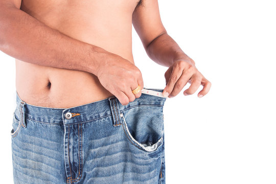Man abdomen with measuring tape