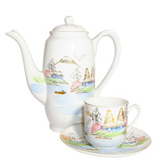Teapot and coffee cup isolated on white. Beautiful porcelain.

