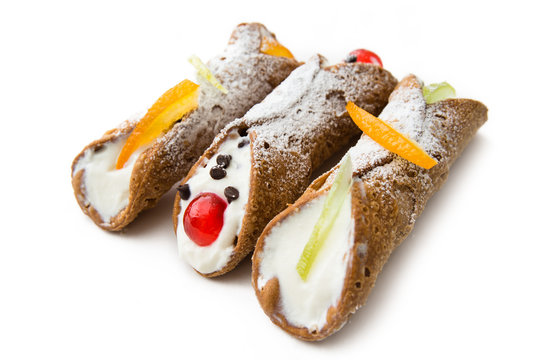 Sicilian cannoli, italian dessert with ricotta cheese, chocolate chips and candied fruit 
