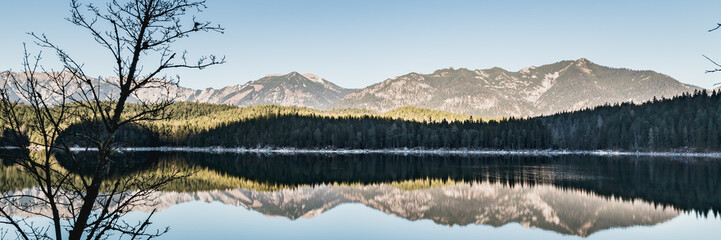 Winter landscape with lake and mountains, Zugspitze, Aibsee, Germany