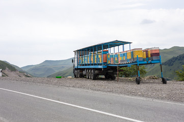Truck with hives for bees in the mountains in Chechnya, Russia
