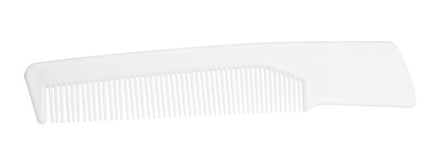 Bright plastic comb isolated on white background