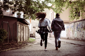 Couple running outdoor.