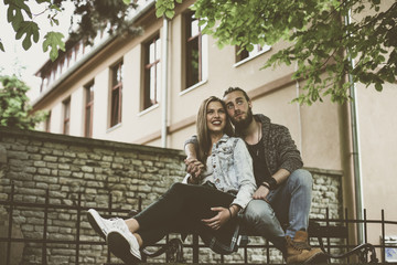 Happy young couple having fun in the city.