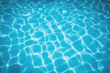 Fototapeta na wymiar Blue and bright ripple water and surface in swimming pool