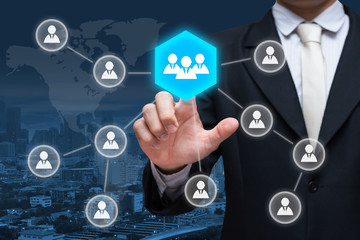 Businessman hand touch businessman icon network - HR,HRM,MLM, teamwork & leadership concept