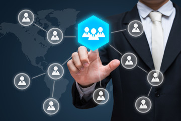 Businessman hand touch businessman icon network - HR,HRM,MLM, teamwork & leadership concept