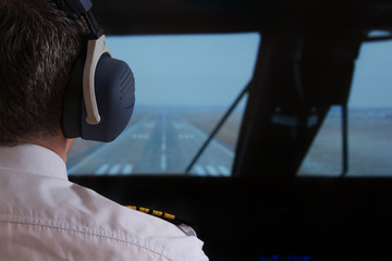 Pilot in the airlpane cockpit