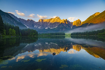 panorama of mountain lake in the morning in the Julian Alps in Italy