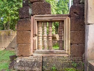 The ancient carved stone bar window of Banteay  Srei or Banteay Srey Hindu Temple in Siem Reap, Cambodia