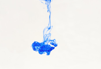 Abstract transition blue color ink Dropped Into Water