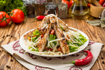 Grilled Chicken Caesar Salad with Cheese and Croutons