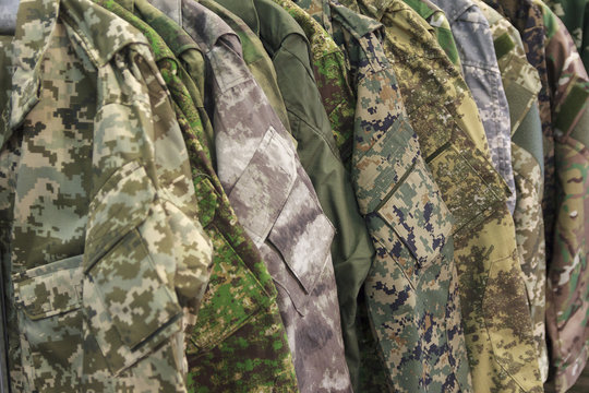Samples camouflage military clothes in the store