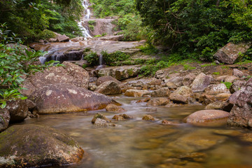 Naklejka na ściany i meble A beautiful waterfall in forest with rock foreground located south of thailand