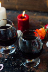 Romantic dinner drink - wine or brendy in glass.