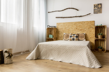 Minimalistic bedroom in ecological style
