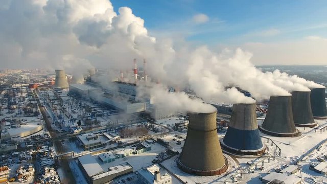 Steam, smoke from pipes at a thermal power station. 4K.