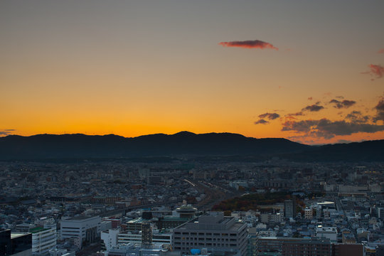 A cityscapeview of kyoto janpan at sunset timing