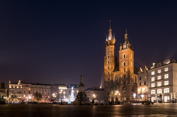 Fototapeta na wymiar Main Square and St. Mary's Church in Krakow at Night