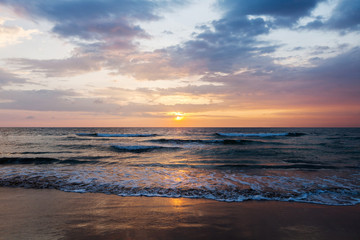 Fototapeta na wymiar Magic purple sunrise over ocean