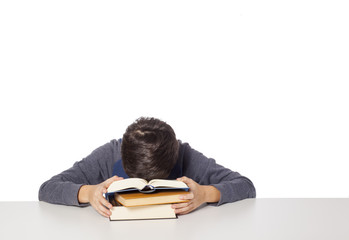 child sleeps on the books