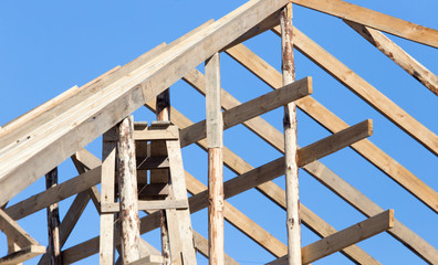 Wooden roof frame on a construction site