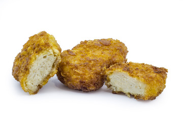 Deep fried chicken nuggets isolated on white background. Clipping path included in JPEG.